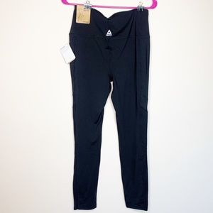 Black Reebok yoga workout pants with mesh details